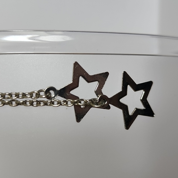 Silver Tone Cascading Stars Earrings - Picture 2 of 4